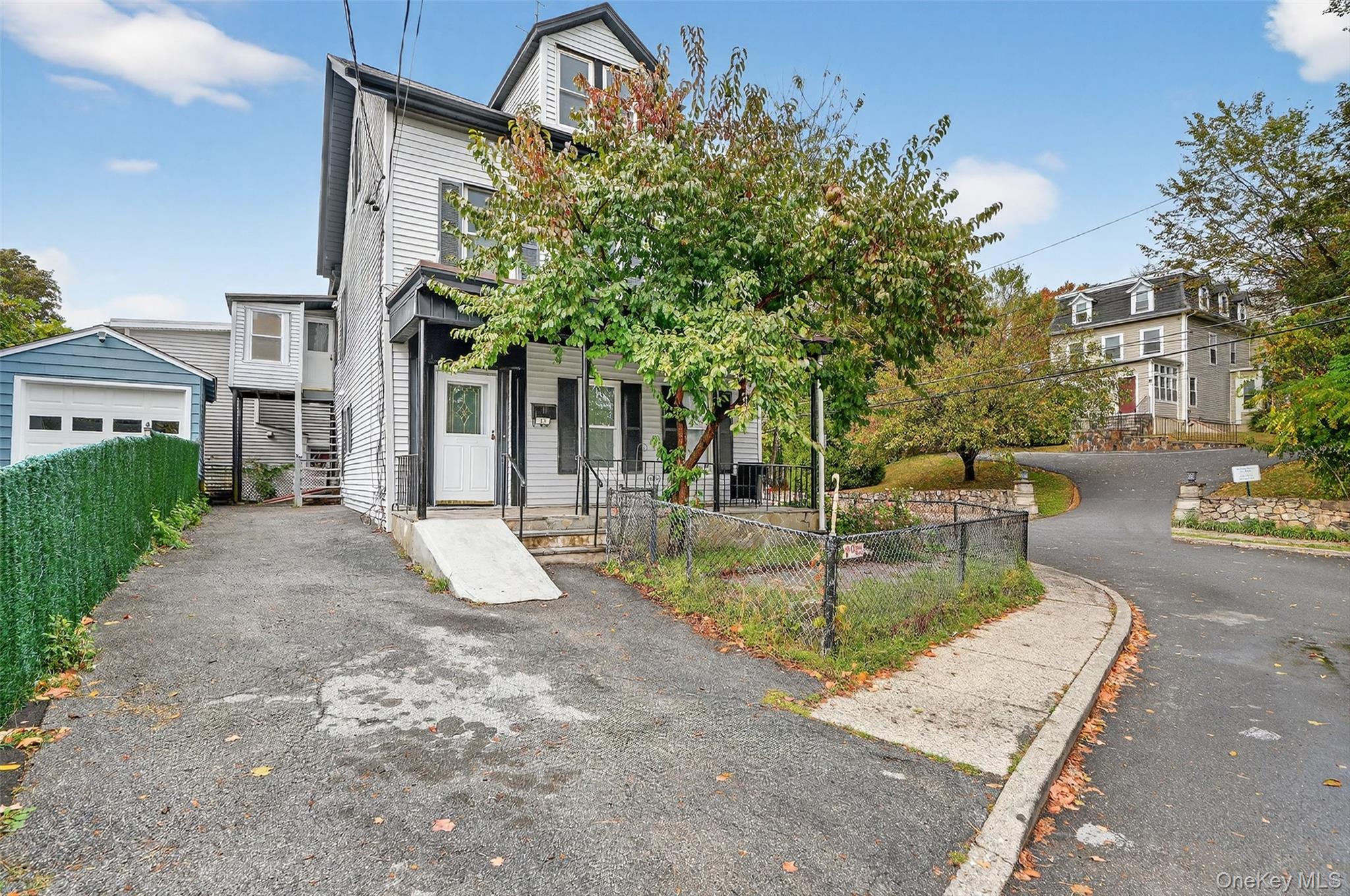 23 Ann Street, Unit 1 Ossining, NY 10562 - Photo 4 of 30 a view of a house with tree s