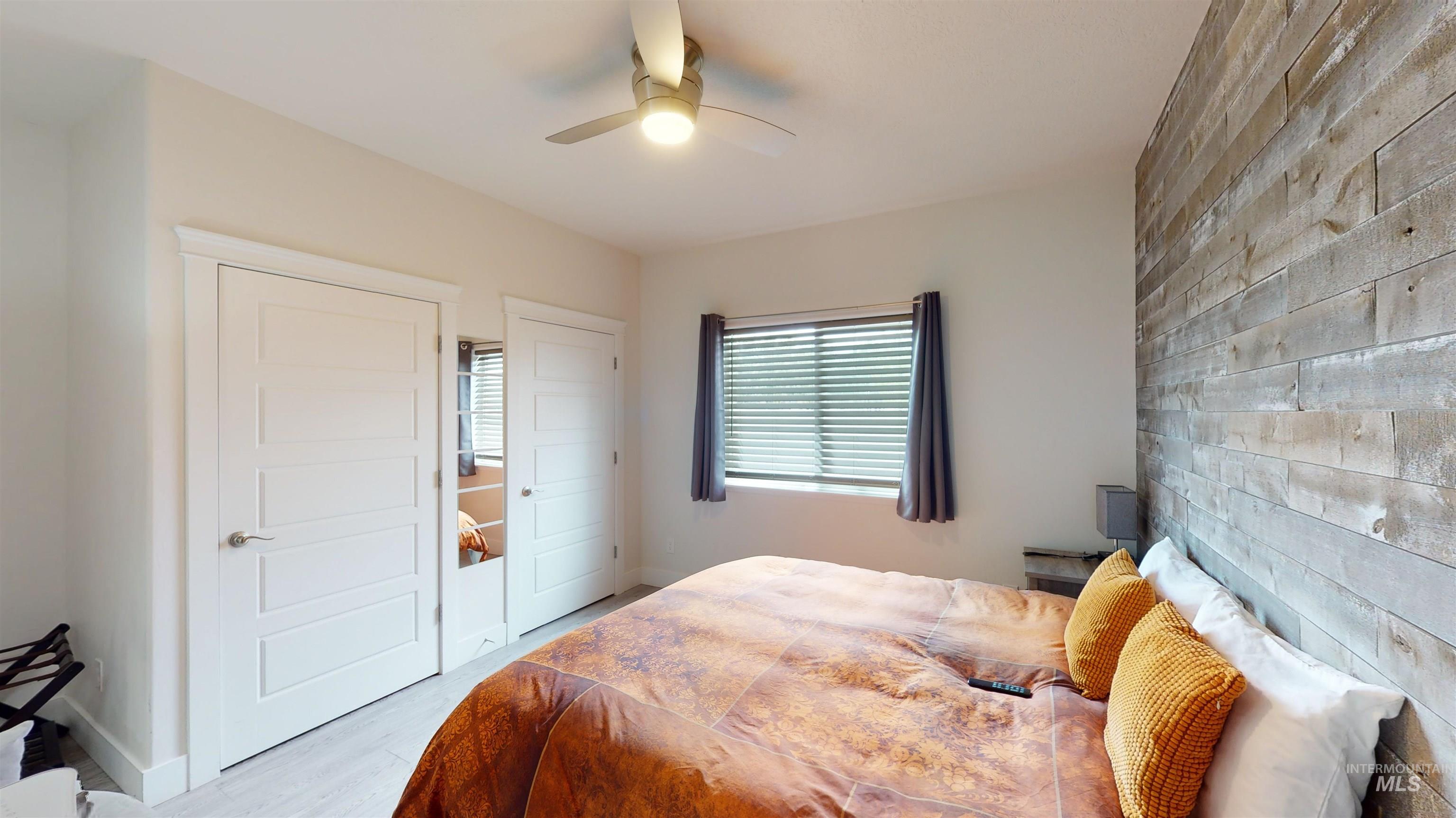 1087 Easy Avenue Twin Falls, ID 83301 - Photo 11 of 25 Bedroom featuring light wood-style flooring and ceiling fan