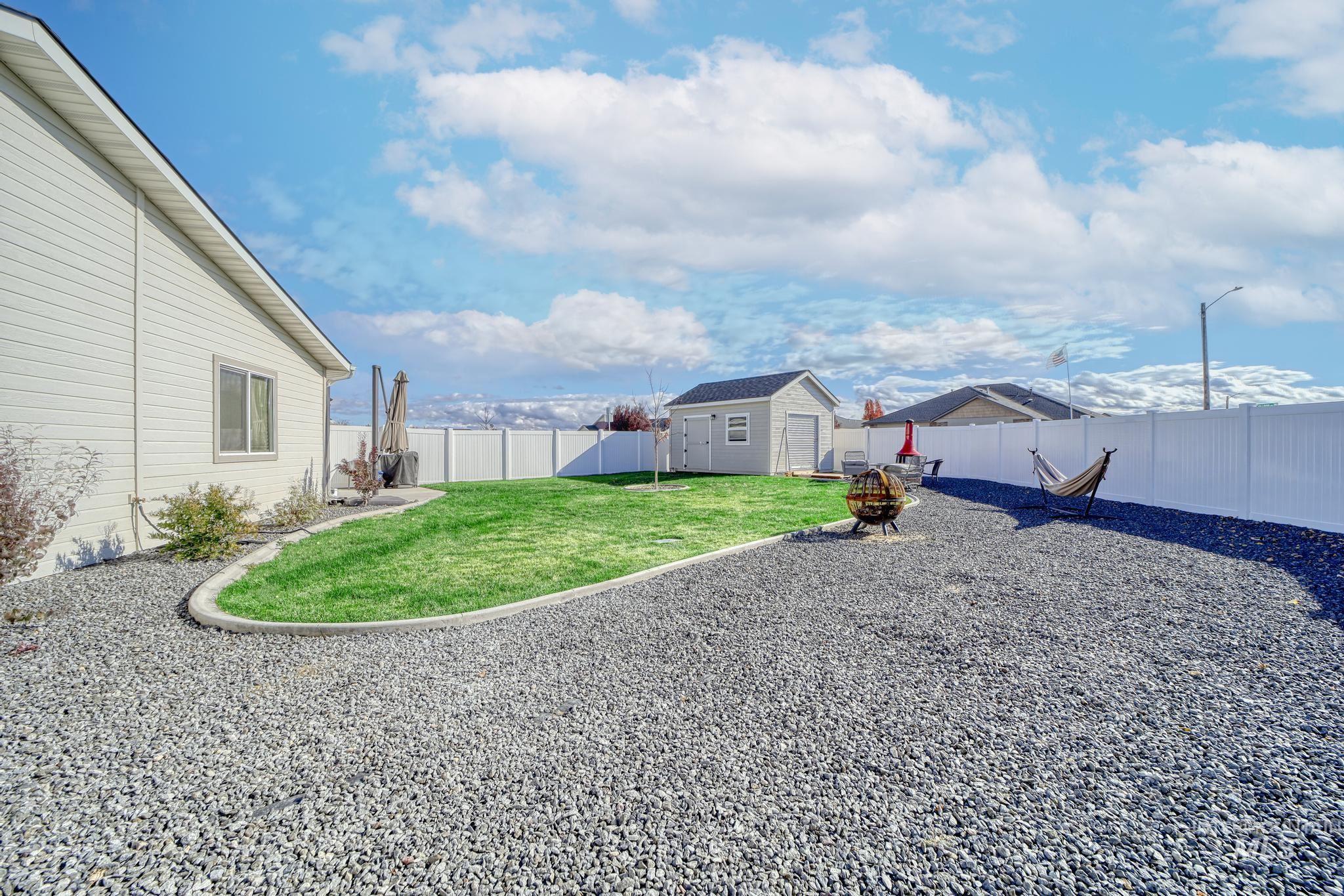 1087 Easy Avenue Twin Falls, ID 83301 - Photo 20 of 25 Fenced backyard featuring a shed