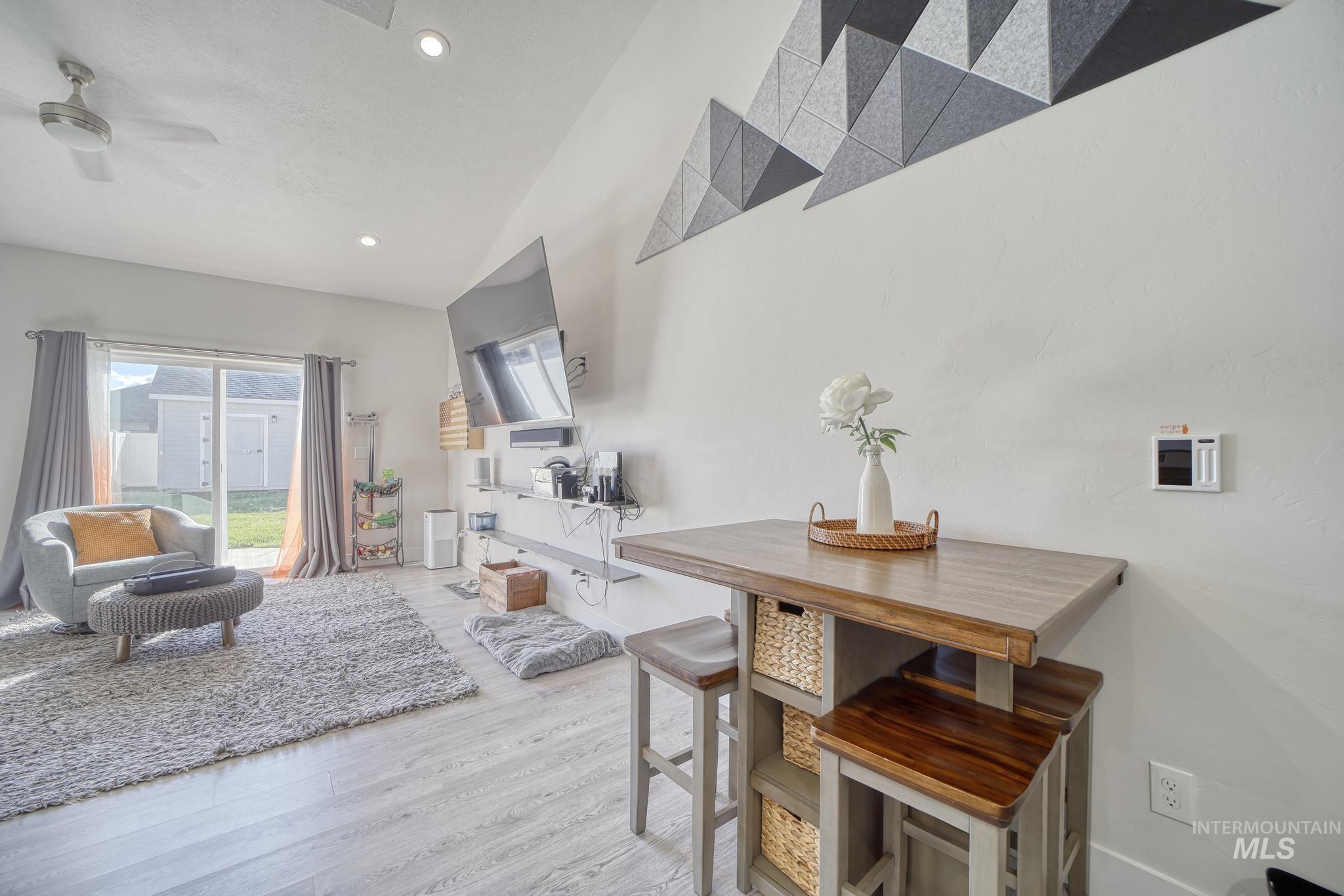 1087 Easy Avenue Twin Falls, ID 83301 - Photo 5 of 25 Dining area featuring light wood-style floors, recessed lighting, and a ceiling fan