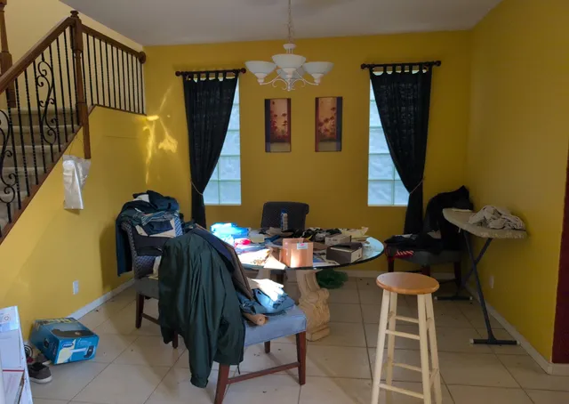 a table and chairs in a room