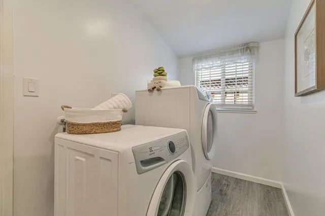 a utility room with dryer and washer