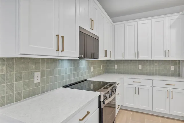 an empty room with a empty space and window