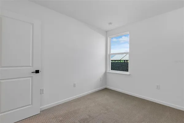 a view of a room with an empty space