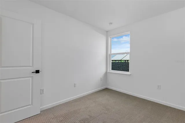 a view of a room with an empty space