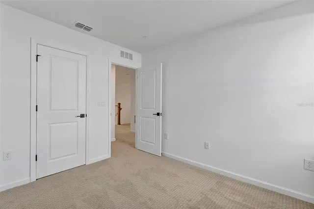 a view of front door and trees