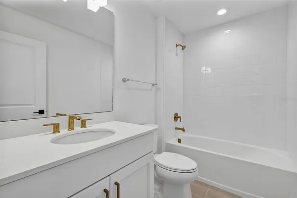 a view of a swimming pool and lounge chair