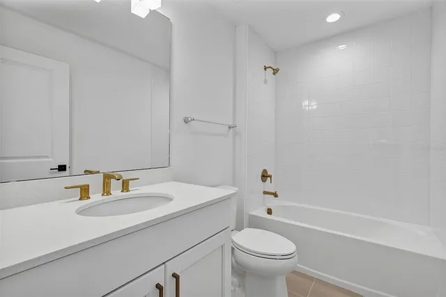 a view of a swimming pool and lounge chair