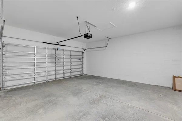 a room with gym equipment and a large window