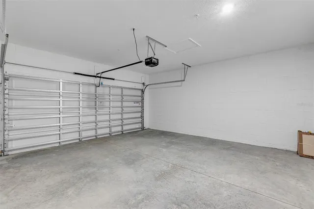 a room with gym equipment and a large window