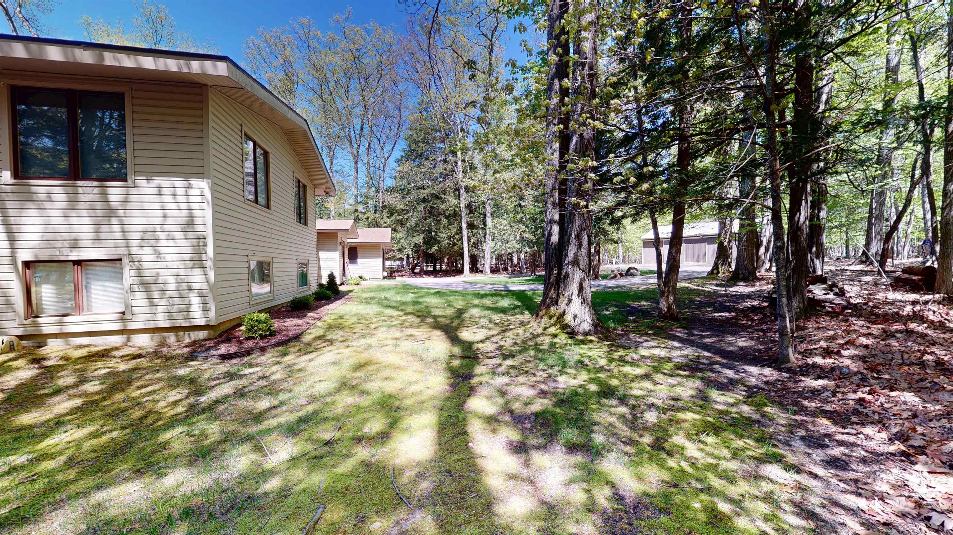 8645 Skegemog Point Road Williamsburg, MI 49690 - Photo 19 of 71