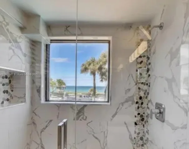 a view of a balcony with plants