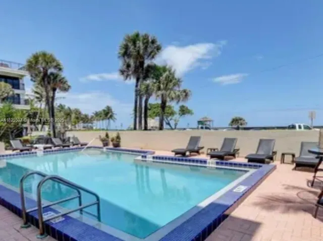 a view of a lake and a yard