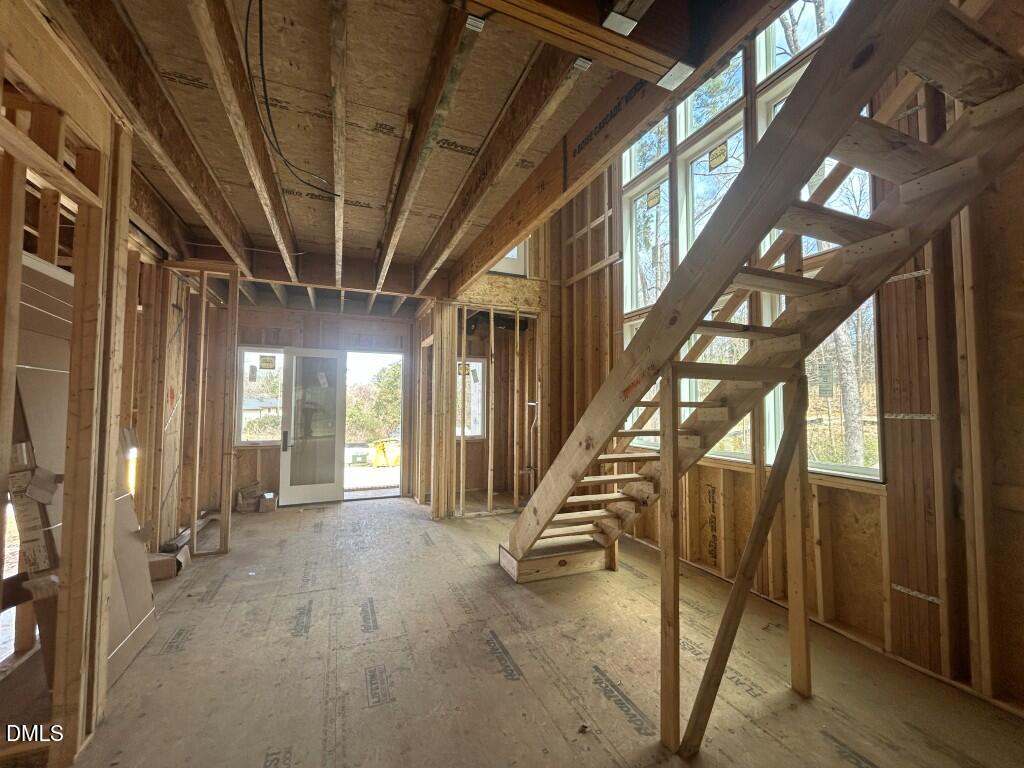 1003 Phoenix Place Raleigh, NC 27610 - Photo 4 of 7 a view of an entryway with staircase
