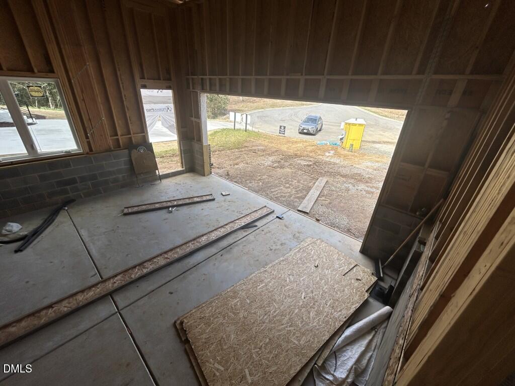 1003 Phoenix Place Raleigh, NC 27610 - Photo 5 of 7 a view of an empty room and window