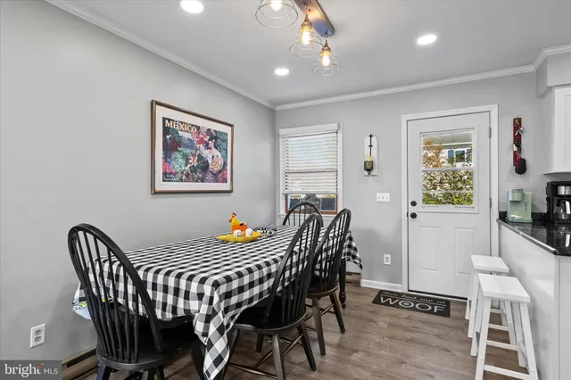 a view of a dining room with furniture