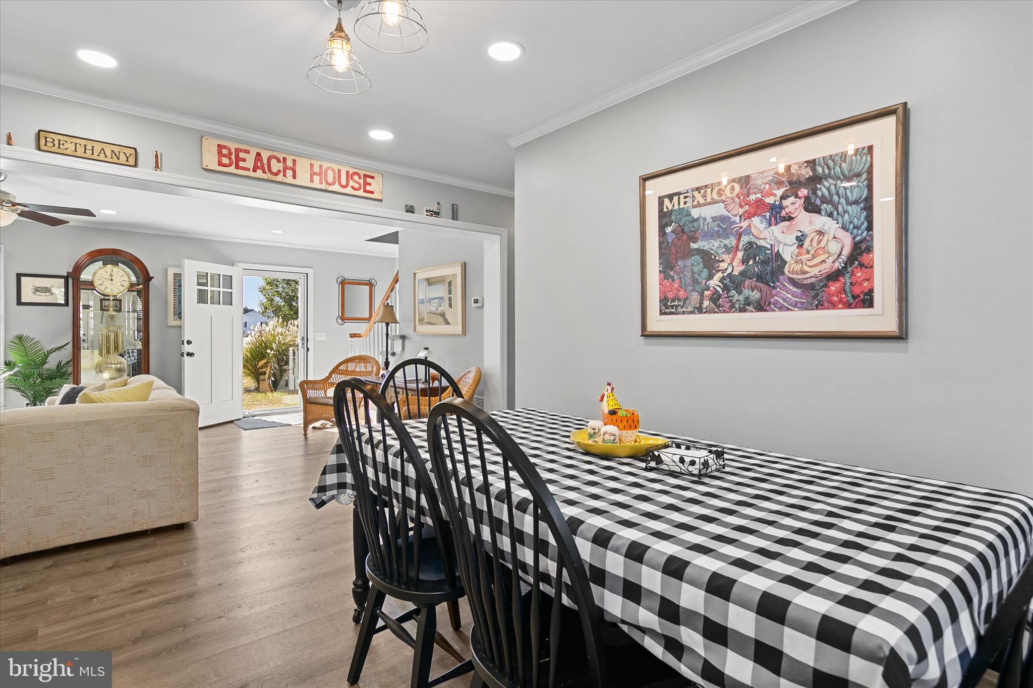 37239 Main Street Ocean View, DE 19970 - Photo 15 of 43 a bedroom with furniture and wooden floor