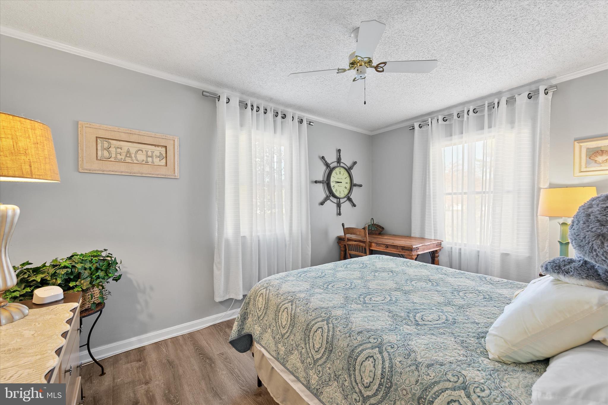 37239 Main Street Ocean View, DE 19970 - Photo 23 of 43 a bedroom with a bed and a window