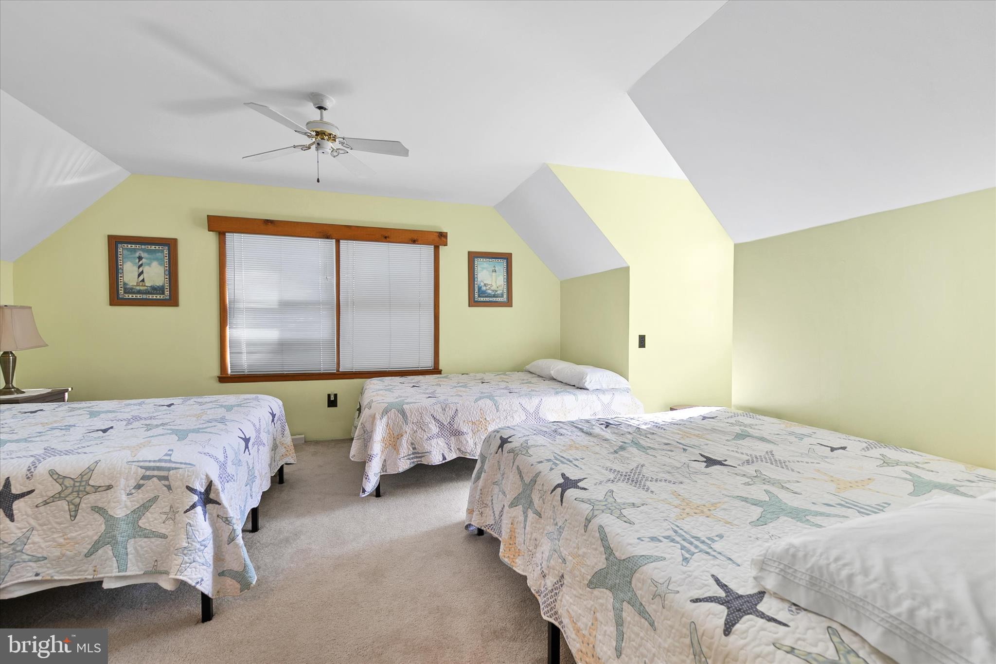 37239 Main Street Ocean View, DE 19970 - Photo 26 of 43 a bedroom with two beds and a window