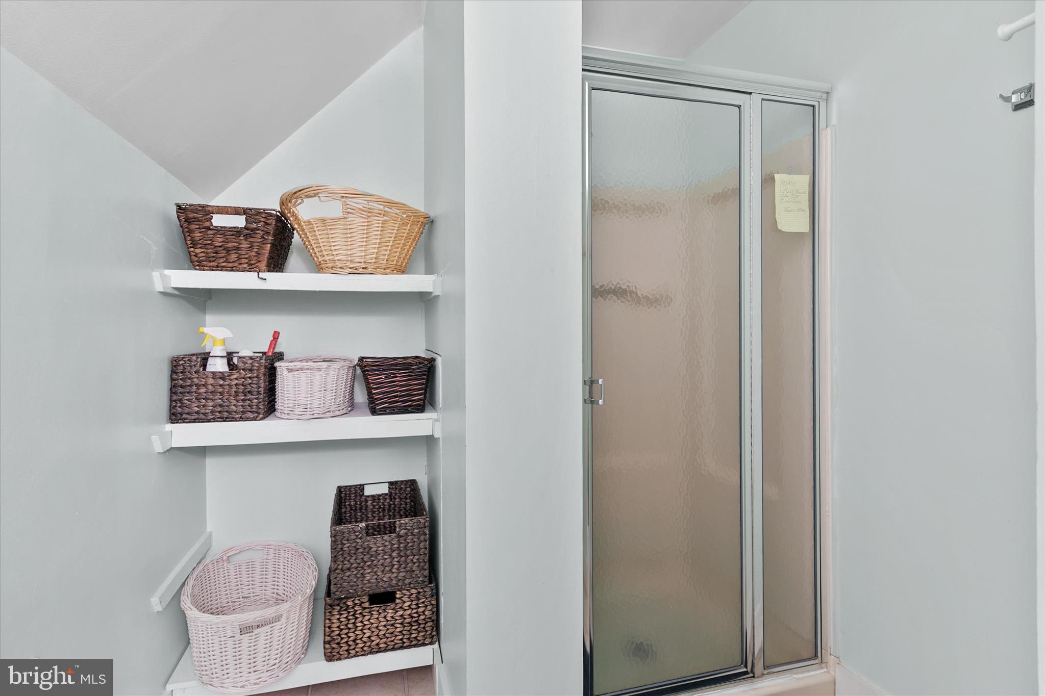 37239 Main Street Ocean View, DE 19970 - Photo 29 of 43 a bathroom with a toilet and a shower curtain