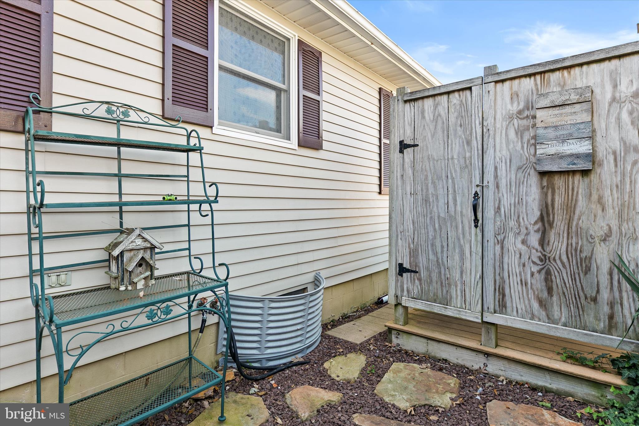 37239 Main Street Ocean View, DE 19970 - Photo 37 of 43 a view of a house with backyard and wooden fence