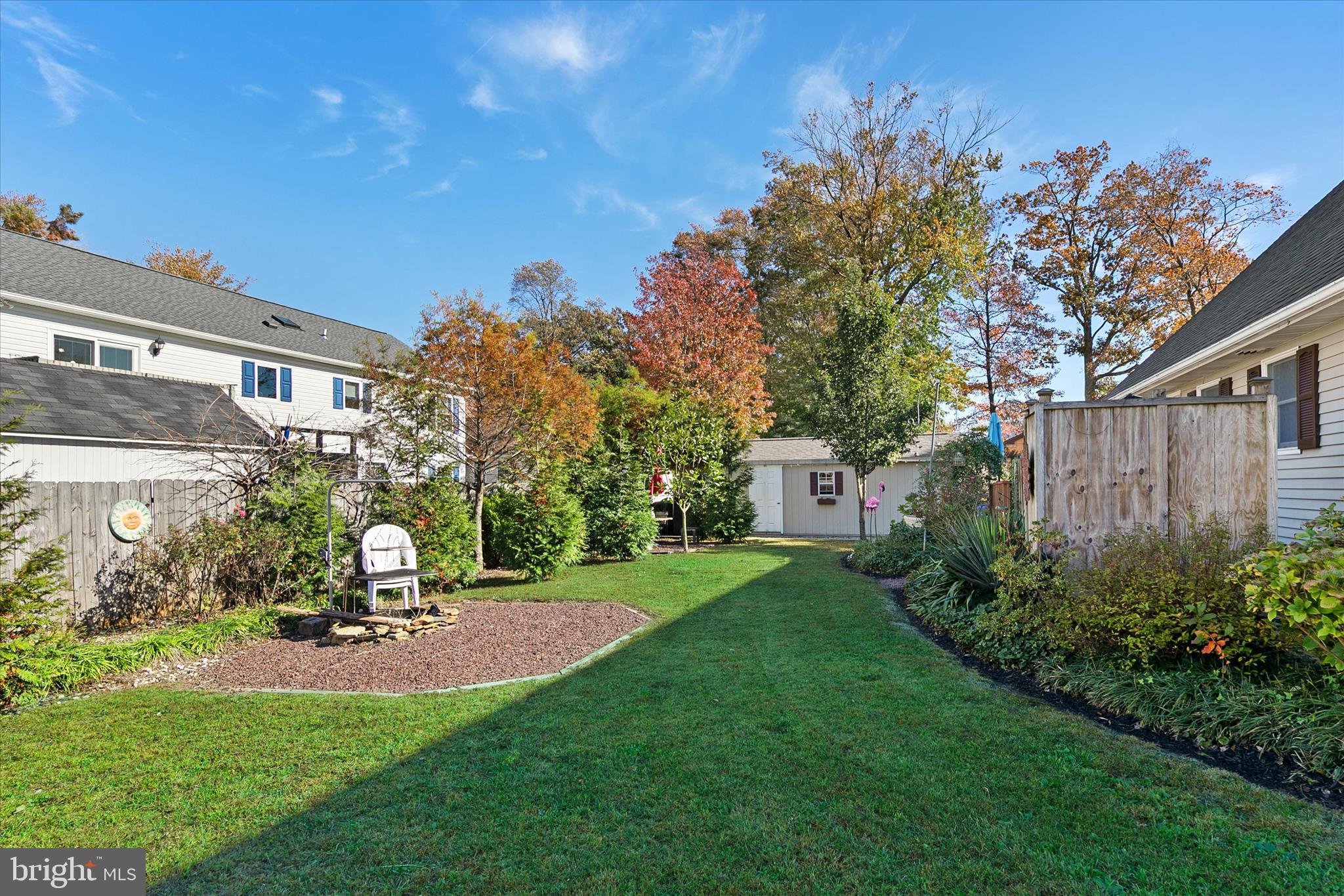 37239 Main Street Ocean View, DE 19970 - Photo 43 of 43 a view of a chair and table in the garden