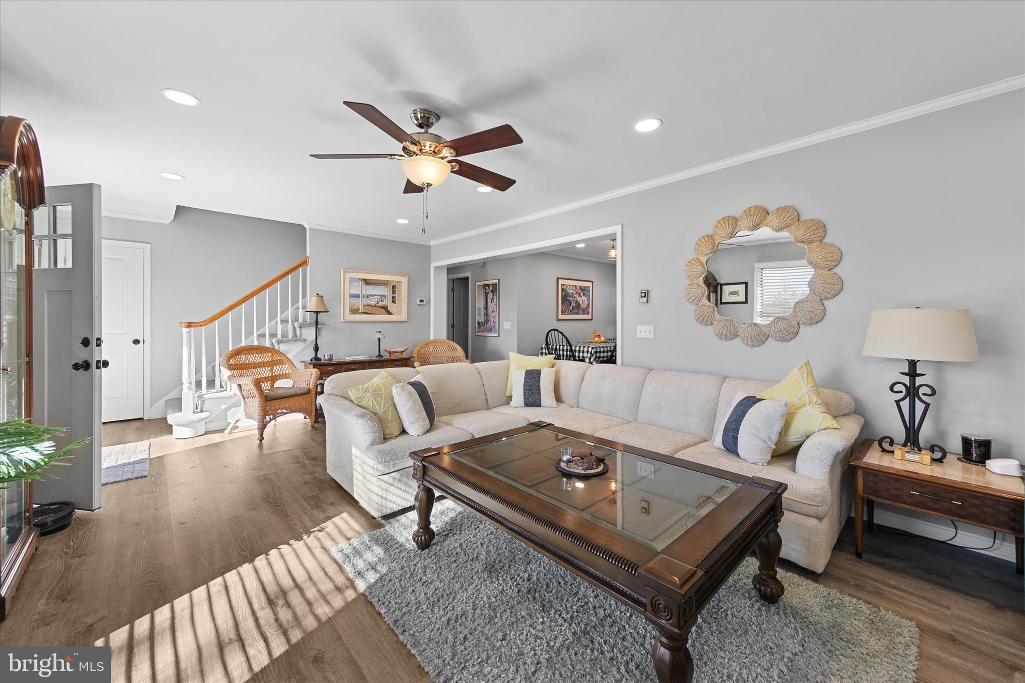 37239 Main Street Ocean View, DE 19970 - Photo 5 of 43 a living room with furniture and a rug
