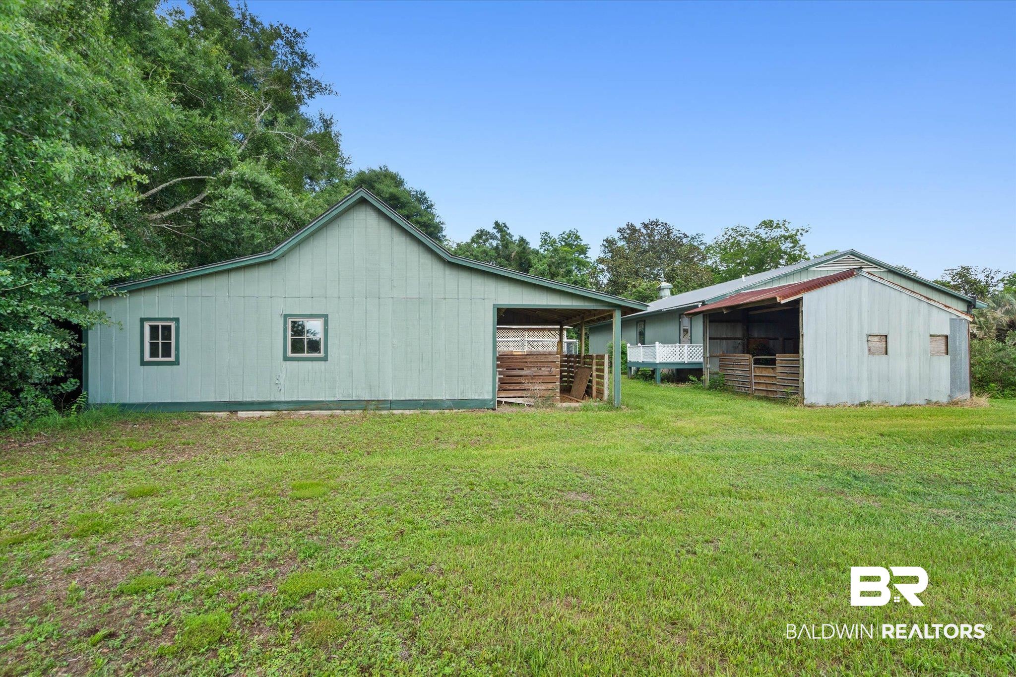 23953 Peturis Road Loxley, AL 36551 - Photo 41 of 56 Sliding doors lead to workshop