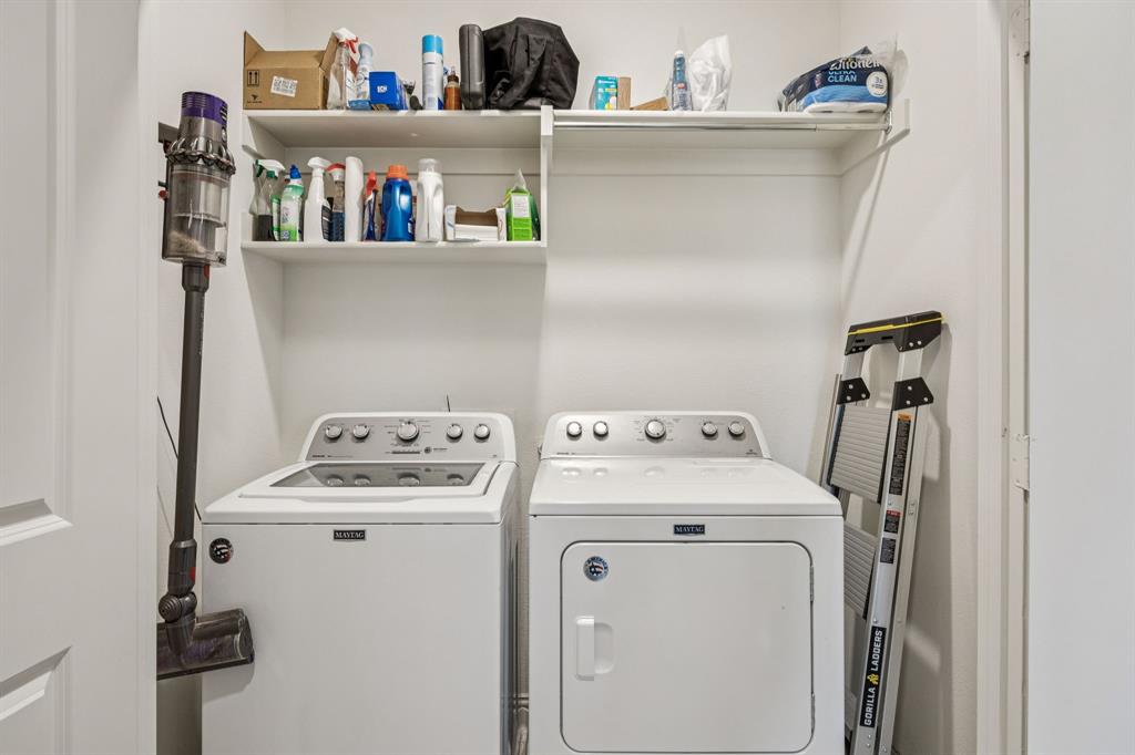 1010 Switchgrass Lane Allen, TX 75013 - Photo 22 of 25 a utility room with dryer and washer