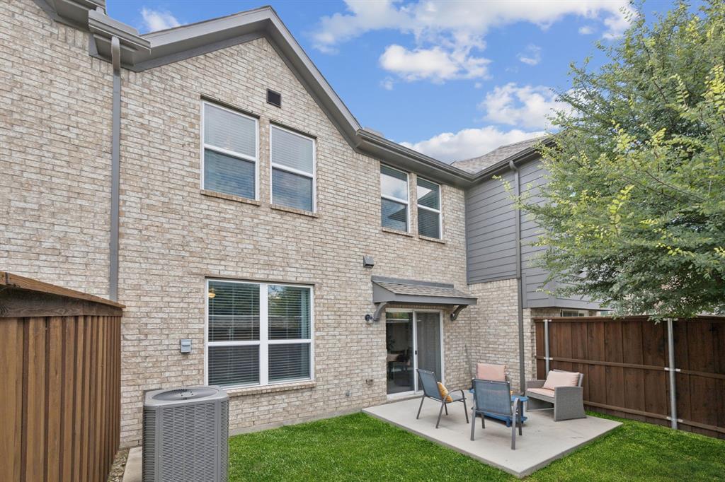 1010 Switchgrass Lane Allen, TX 75013 - Photo 24 of 25 a front view of a house with garden
