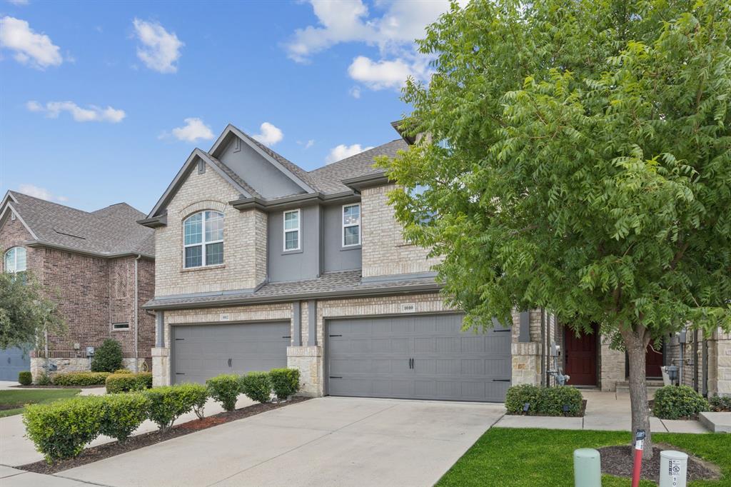 1010 Switchgrass Lane Allen, TX 75013 - Photo 25 of 25 a front view of a house with a garden