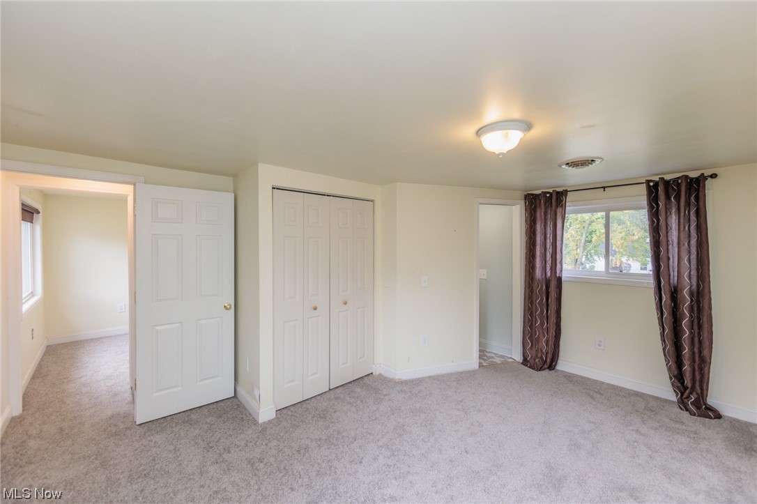 355 Dellwood Road Avon Lake, OH 44012 - Photo 28 of 35 Unfurnished bedroom featuring a closet and light colored carpet