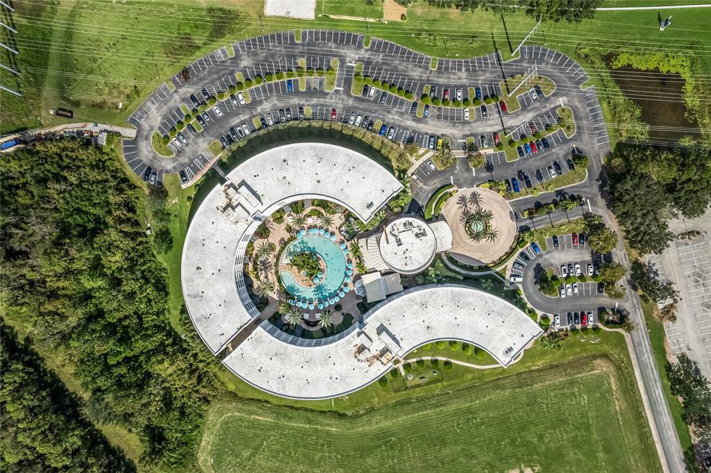 225 Celebration Place, Unit 117 Celebration, FL 34747 - Photo 27 of 30 an aerial view of a house with outdoor space and swimming pool