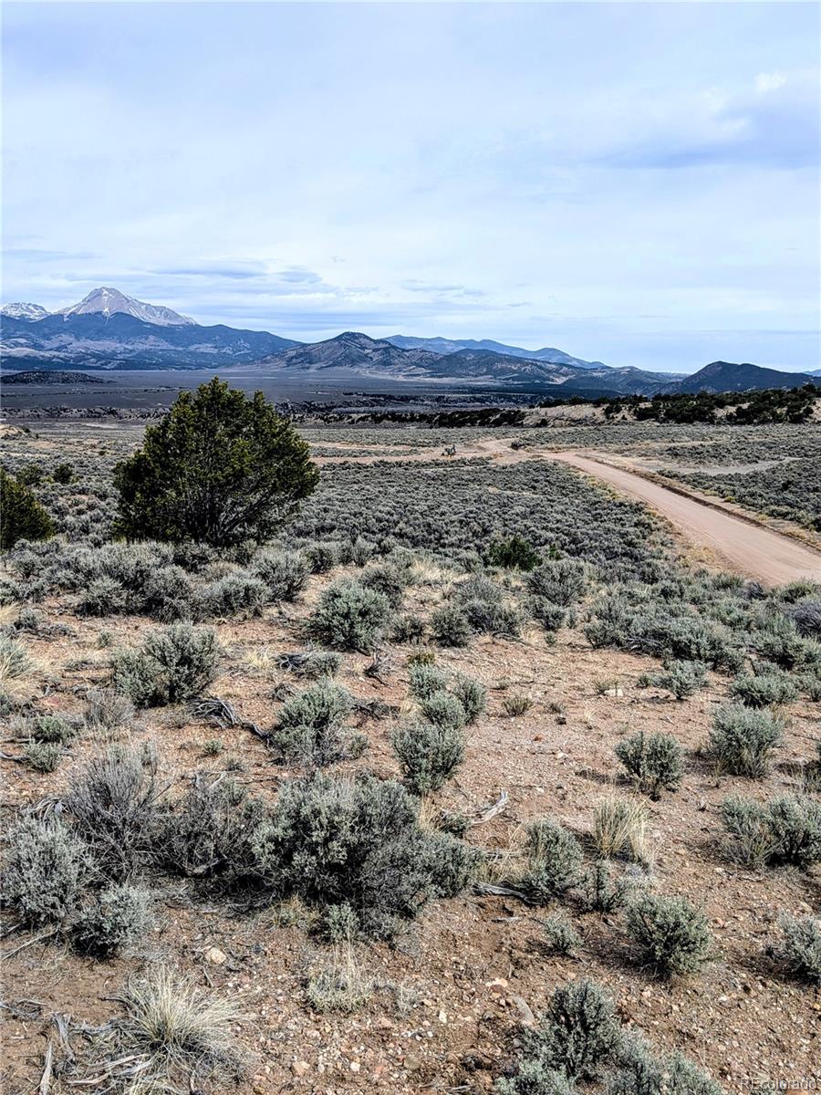 Lot 3589 Freylinghuysen Road Fort Garland, CO 81133 - Photo 5 of 9 a view of a large yard with wooden fence