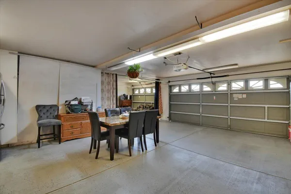 a view of a workspace with furniture