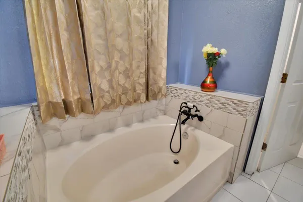 a bathroom with a bathtub