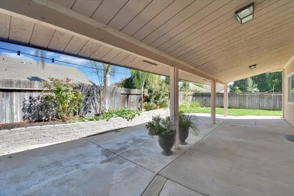 a view of a porch with garden