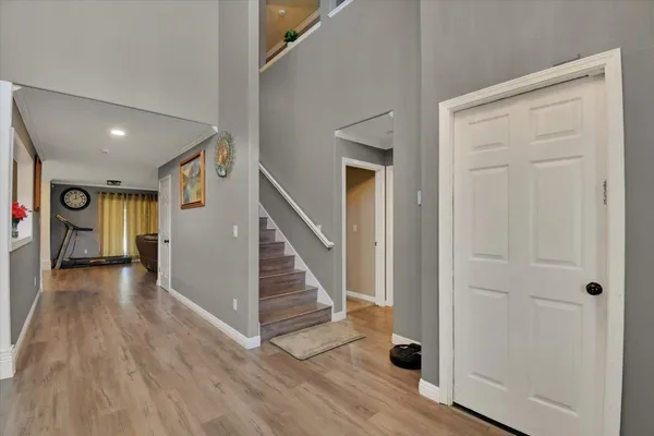 a view of entryway with wooden floor