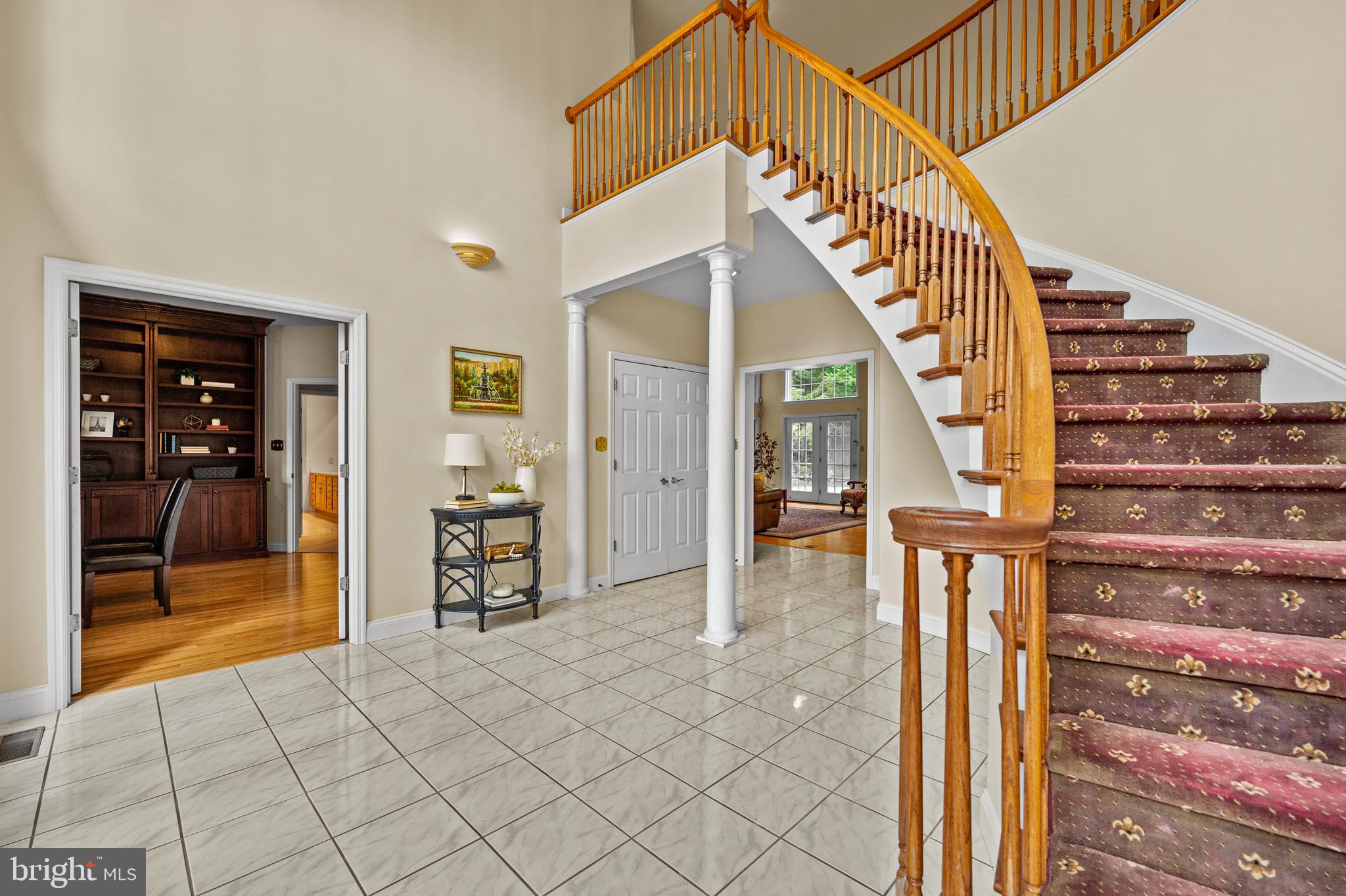 1238 Hunters Road Mohnton, PA 19540 - Photo 6 of 62 a view of an entryway with wooden floor and a livingroom view