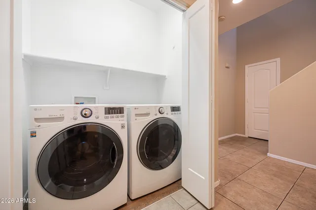a bathroom with a sink toilet and a mirror