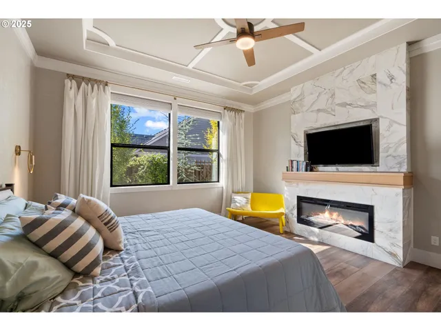 a bathroom with a double vanity sink mirror and bathtub