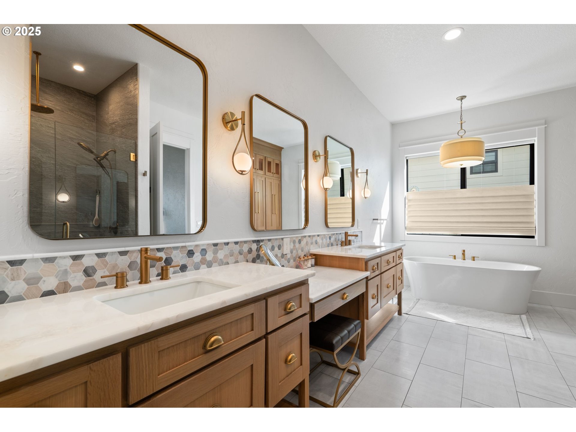 3911 Northwest 114th Street Vancouver, WA 98685 - Photo 14 of 30 a bathroom with a double vanity sink mirror and bathtub