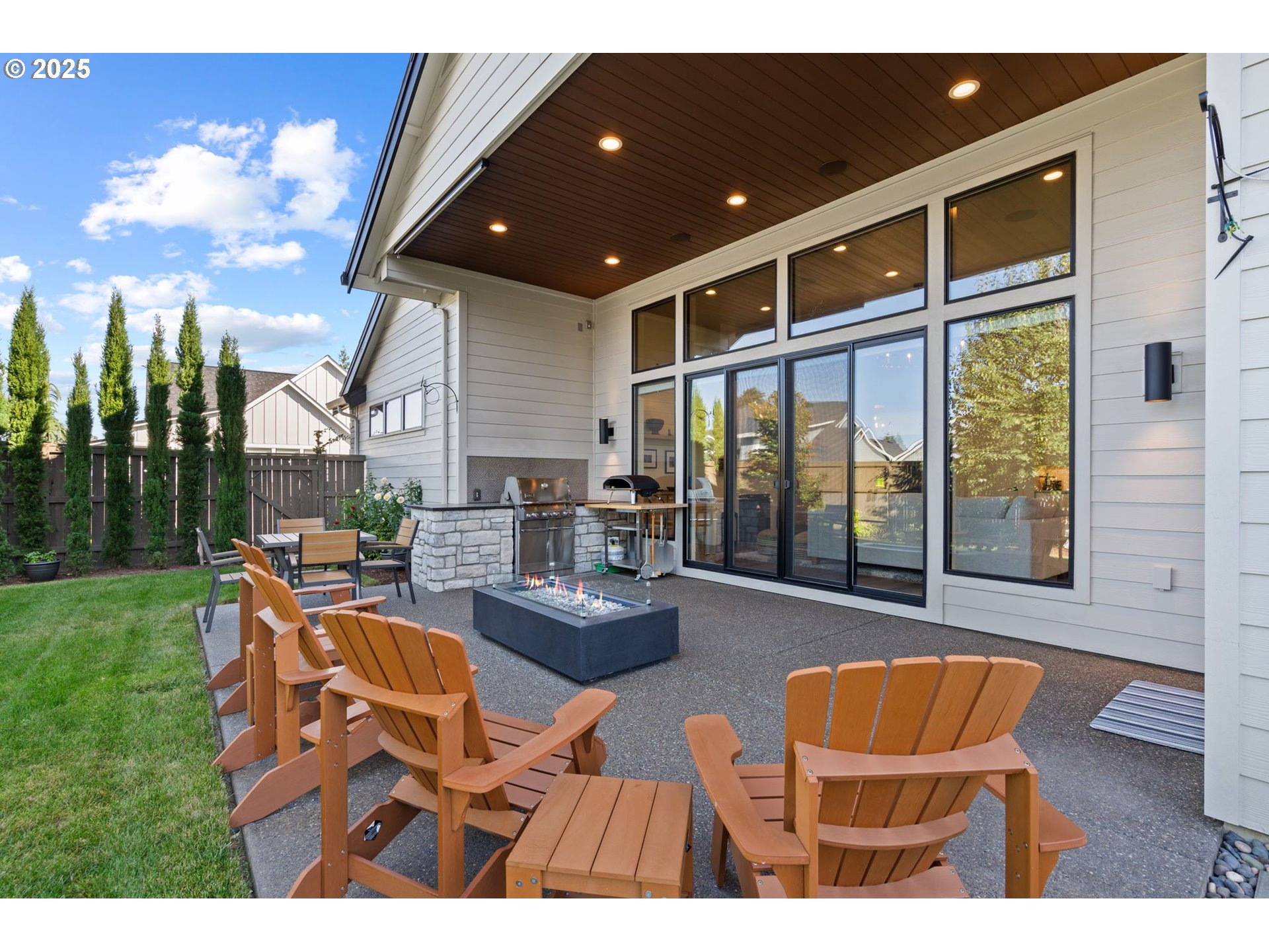 3911 Northwest 114th Street Vancouver, WA 98685 - Photo 23 of 30 a living room with furniture and a floor to ceiling window