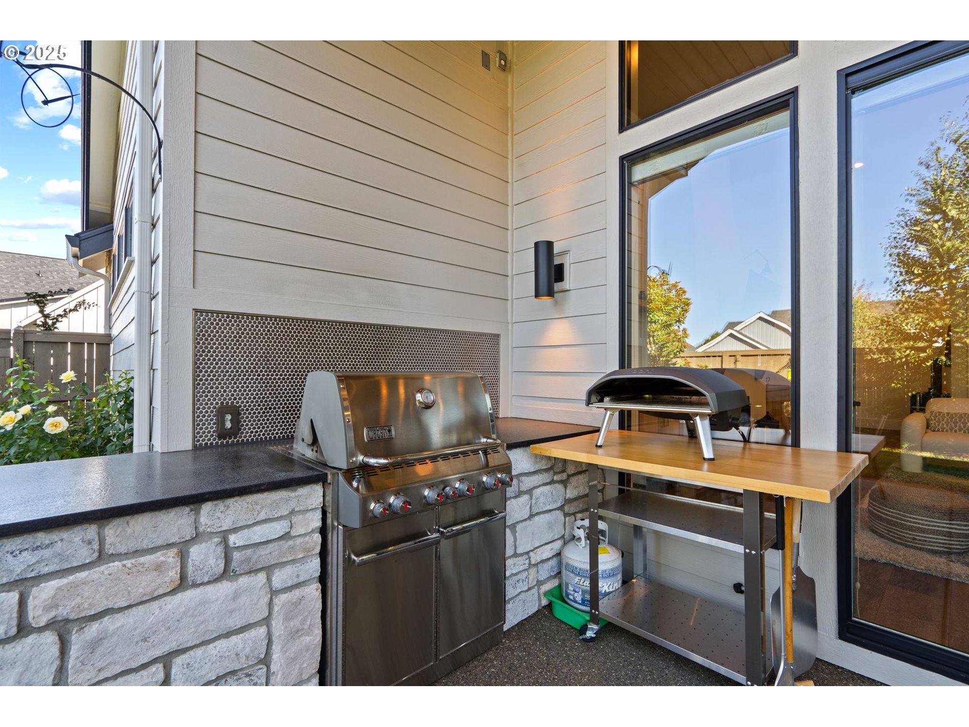 3911 Northwest 114th Street Vancouver, WA 98685 - Photo 24 of 30 a kitchen with a stove a sink and a wooden cabinets