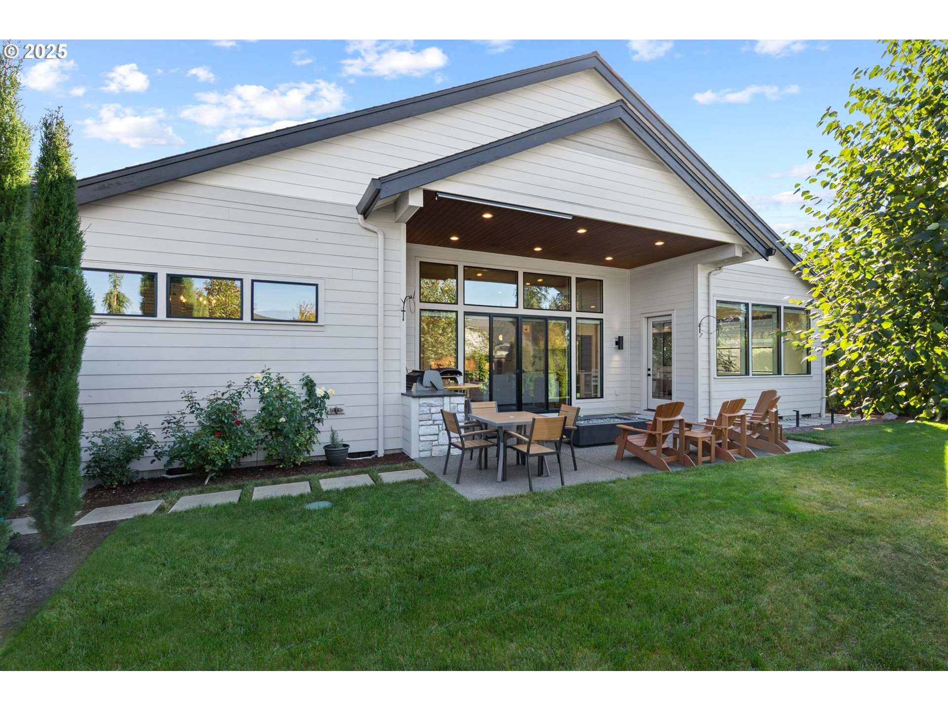 3911 Northwest 114th Street Vancouver, WA 98685 - Photo 26 of 30 a backyard of a house with table and chairs