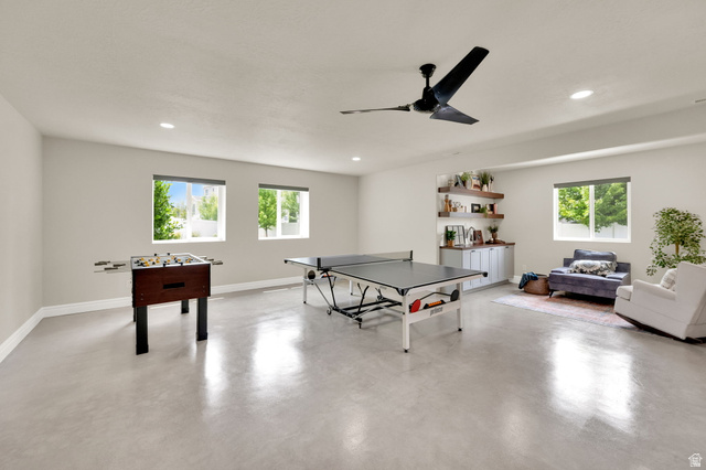 1132 South 1300th Street West Mapleton, UT 84664 - Photo 30 of 52 Spacious recreation room featuring light-toned flooring, recessed lighting, and a contemporary ceiling fan