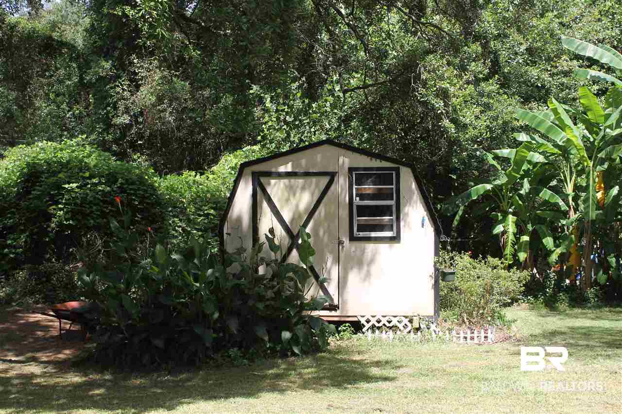 4587 Emerald Drive East Mobile, AL 36619 - Photo 13 of 16 Storage building in addition to attached storage