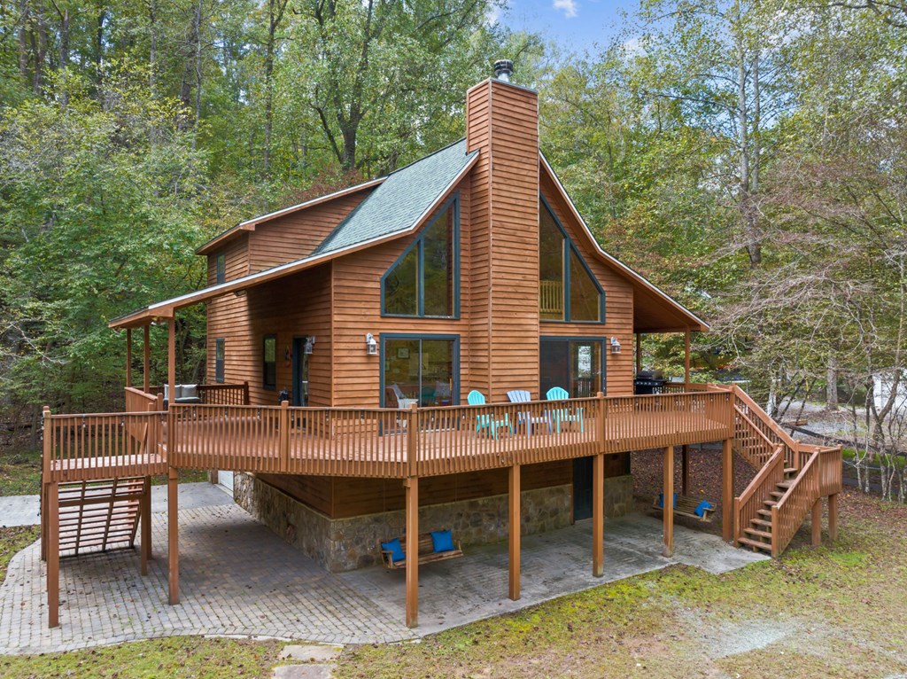 96 Holiday Court Ellijay, GA 30540 - Photo 38 of 51 a view of house with a chairs in balcony