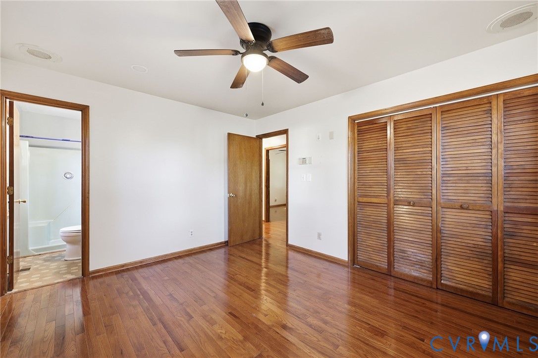 2521 Fort Lee Road Petersburg, VA 23805 - Photo 10 of 27 wooden floor in an empty room with a window