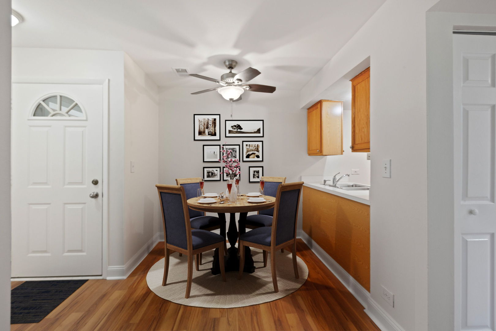 1975 Kenilworth Circle, Unit B Hoffman Estates, IL 60169 - Photo 4 of 21 a view of a dining room with furniture and chandelier